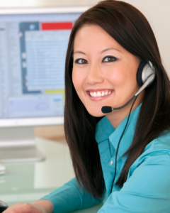a woman wearing a headset Lowcountry dental services PPO Reimbursements